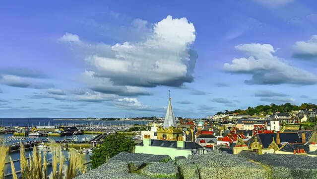 Time lapse of beautiful Channel Islands harbor landscape featuring Church and houses