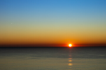 Sunrise Breaks the Horizon over the Mediterranean Sea