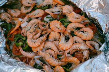 Shrimp and vegetables cooked in tinfoil
