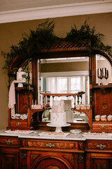 Arched wedding display for elegant wedding cake and desserts