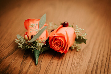 orang boutonnieres for fall wedding