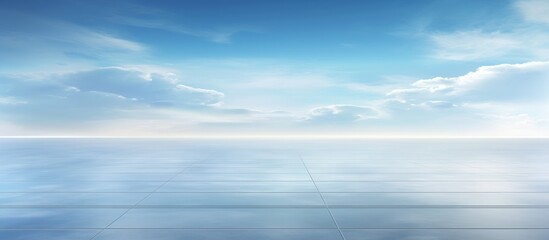 A vast natural landscape featuring a large body of water with a blue sky in the background, scattered with fluffy cumulus clouds at dusk on the horizon - Powered by Adobe