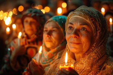 Afwasbaar fotobehang Easter Worship: Believers present candles and Easter cakes at a church service. © ЮРИЙ ПОЗДНИКОВ