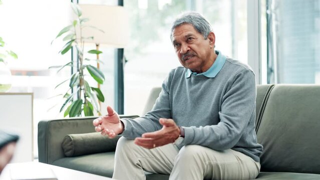 Senior man, therapist and talking for mental health and retirement with psychology and patient. Consulting, psychologist and conversation for advice and wellness with therapy and consultation