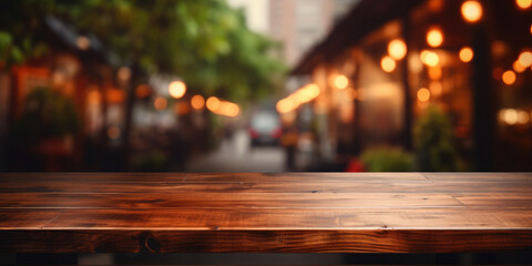 Empty wooden table for product demonstration and presentation on the background of cafe, restaurant, night golden bokeh. - obrazy, fototapety, plakaty