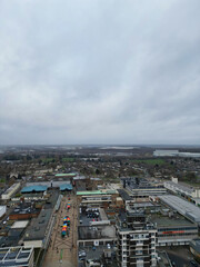 Aerial Footage of Corby Town of Northamptonshire, England United Kingdom on Cold and Cloudy Day of January 1st, 2024. Drone's Camera Footage from Medium High Altitude During Cloudy and Rainy Day.