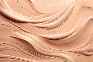 Obraz premium Abstract cosmetic background, beige waves of cream or ointment smeared on the surface. Plastic soft texture of pastel color.