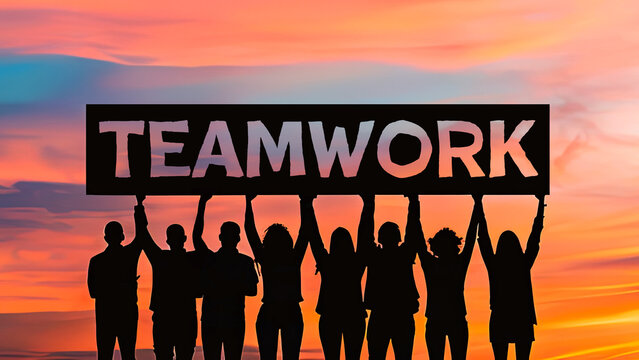 Silhouette of people holding up motivational sign that says Teamwork