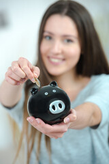 a business woman piggy bank