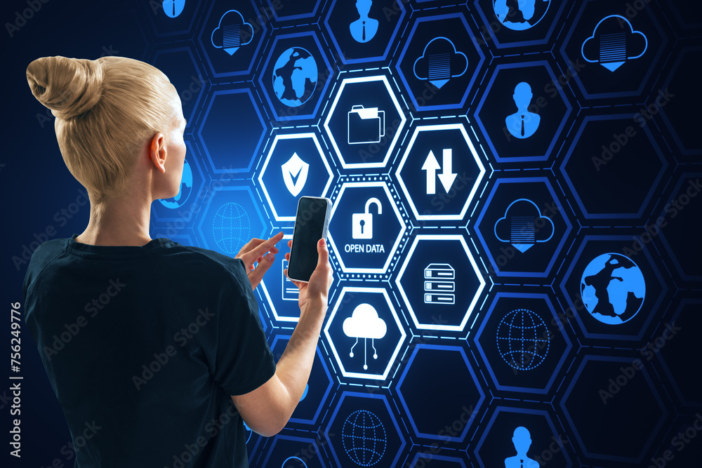Poster back view of young blonde european woman using smartphone with creative open data hexagonal hologram