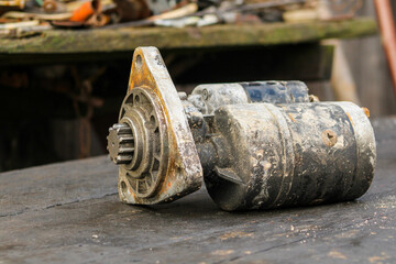 Old worn out diesel engine starter, side view