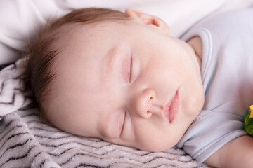 Adorable baby sleeping relaxed and sprawl in parent's bed