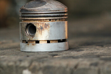 Worn out piston from a motorcycle oposite engine