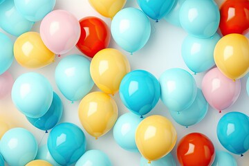A bunch of colorful balloons in various shades of blue, yellow, and red