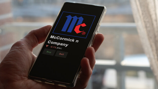 March 02nd 2024 Hunt Valley, Maryland. The logo of McCormick & Company on the screen of an exchange. McCormick & Company price stocks, $MKC on a device.