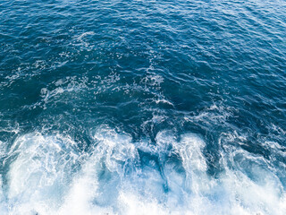 Obraz premium Atlantic ocean water in the south of Tenerife, you can see water pollution, due to landfills contaminating the water. Environment pollution concept