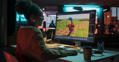 Portrait of Black Female Video Game Designer Creating Metaverse and Design Video Game Character in...