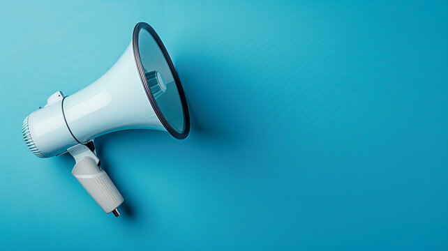 White and orange megaphone on a blue background