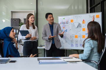 Project manager working and update tasks with milestones progress planning and professional investor working new start up project in the office.