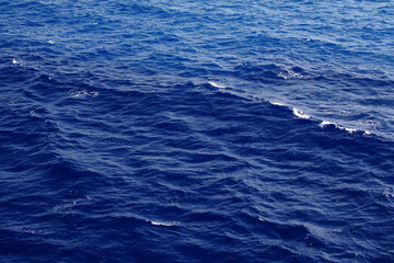 Dark blue sea water surface with ripple