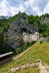 Fototapeta na wymiar Predjama, Slovenia - June 27, 2023: Predjama Castle in Slovenia, Europe. Renaissance castle built within a cave mouth in south central Slovenia.