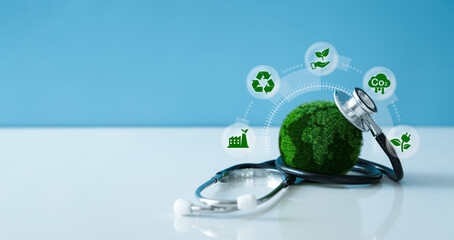 Earth Day - Environment Concept.Green Earth and a stethoscope with Saving the environment and...