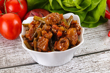 Meatball with vegetables and spices