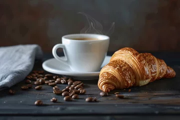 Fotobehang a croissant and coffee on a table © Mariana
