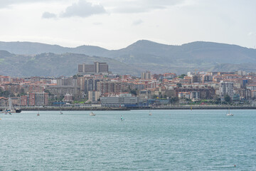 Fototapeta na wymiar panoramic view across the sea to the city of Santurce-Basque country-Spain