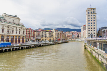 Fototapeta na wymiar Nervión river overlooking the urban area of Bilbao-Basque country-Spain.15-3-2024