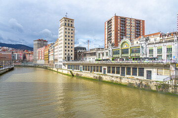 Fototapeta na wymiar Nervión river overlooking the urban area of Bilbao-Basque country-Spain.15-3-2024