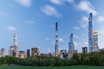 Manhattan skyscrapers and Central Park sunset - obrazy, fototapety, plakaty
