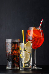 Aperol spritz, cola and gin tonic cocktails - 756304741