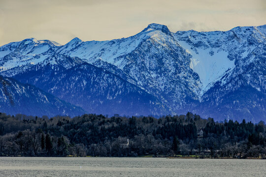 View over the Staffelsee and the island of W&ouml;rth with the St Simpert chapel to the Kochel mountains in the Alps
