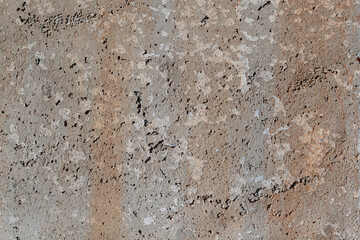 Detail of partially damaged concrete wall