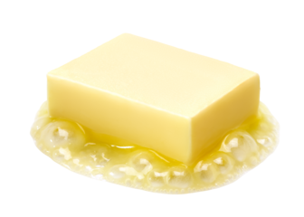A piece of melting butter isolated
