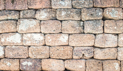 Ruins and old ancient walls, porous stone texture