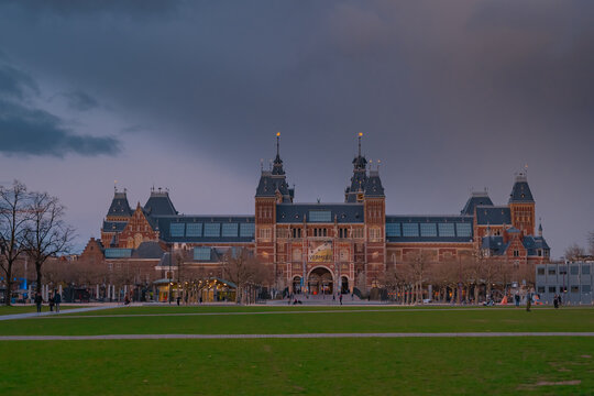 Netherlands, March 28 2023: Amsterdam at summer night. Famous national Rijks museum general view at dusk