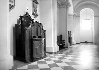 Berdichev, Ukraine. 2023. Cathedral of the Discalced Carmelites. Сonfessional cabinet - obrazy, fototapety, plakaty