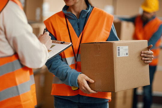 Warehouse workers preparing a shipment