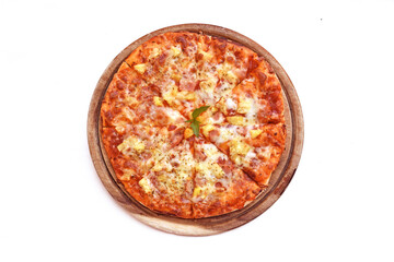 Topview Pizza Hawaiian on a wooden platter. White background