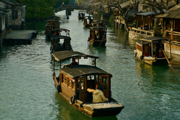 Traditional Chinese boat on a river in Wuzhen, Zhejiang, China