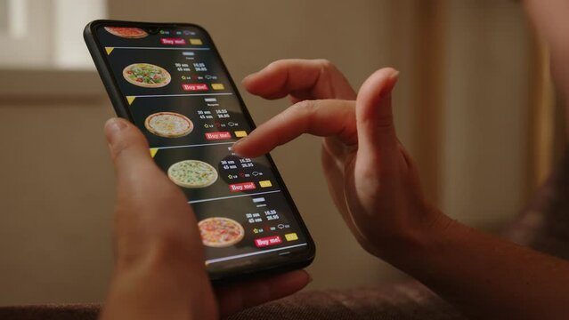 Choosing pizza when ordering online on smartphone. 