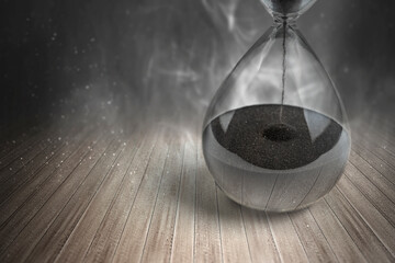 Flowing sand in the hourglass
