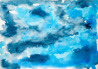 Colorful abstract watercolor paints on white canvas