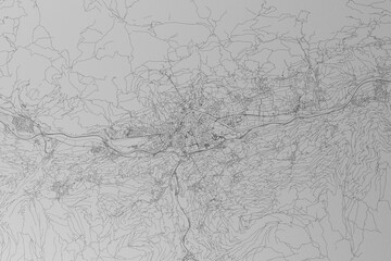 Map of the streets of Innsbruck (Austria) made with black lines on grey paper. Top view. 3d render, illustration