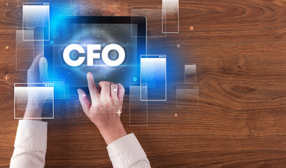 Close-up of a hand holding tablet