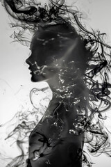 Fototapeta premium Close-up of a white sculpture capturing a woman's face with a surreal, flowing liquid texture, creating a visually striking and contemporary piece of art.