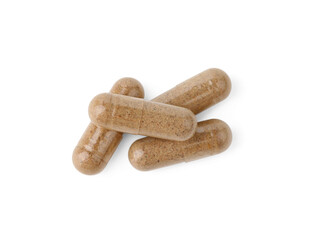 Many vitamin capsules isolated on white, top view