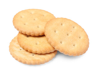 Many crispy crackers isolated on white. Delicious snack
